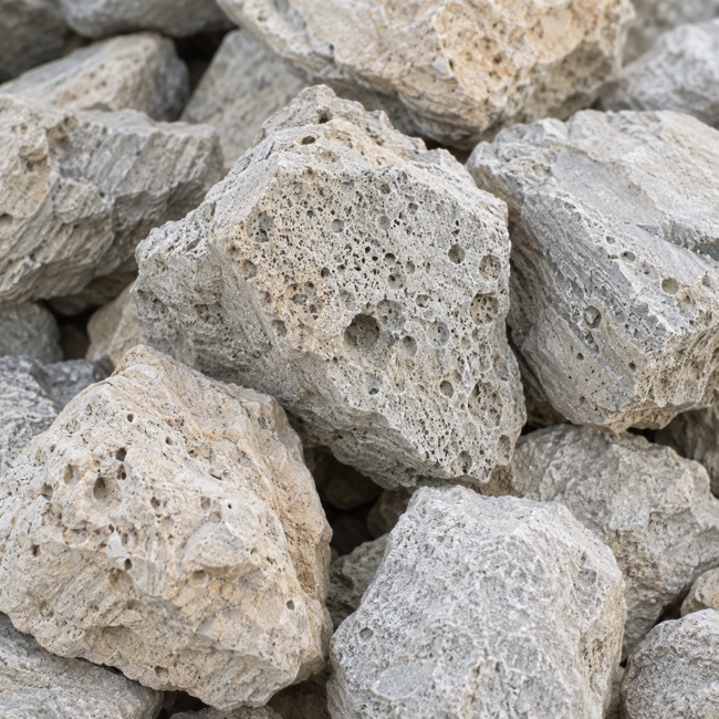 Illustrative close-up of pale porous natural zeolite rocks